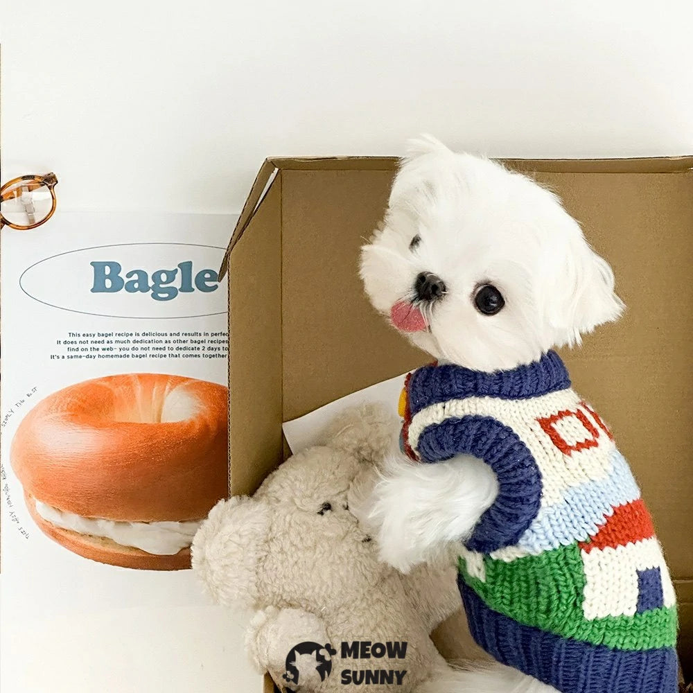 Cute and warm sleeveless knitted sweater for pet dogs, perfect for winter and home wear.