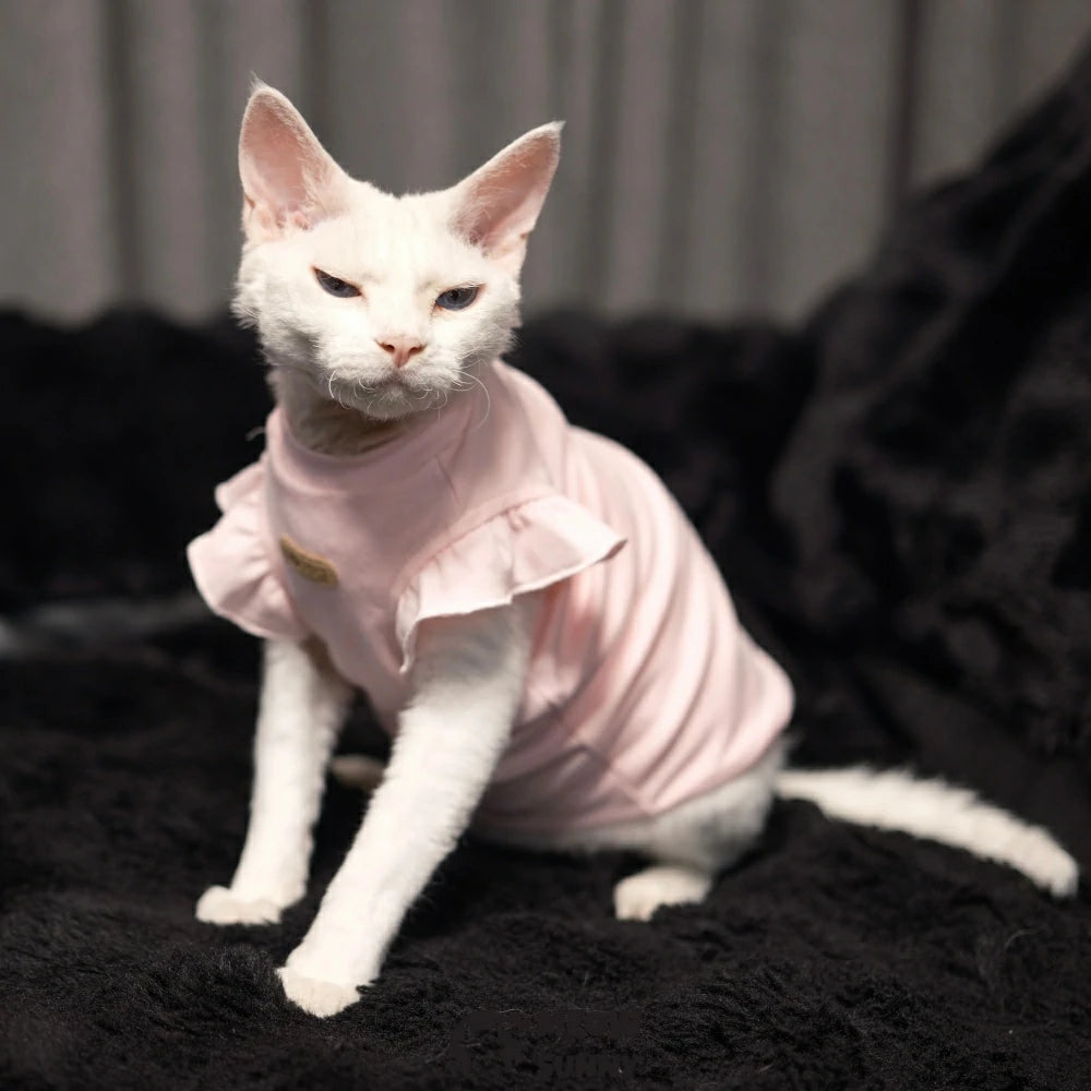Flutter sleeves, hairless cat-patterned pink vest with lace trim