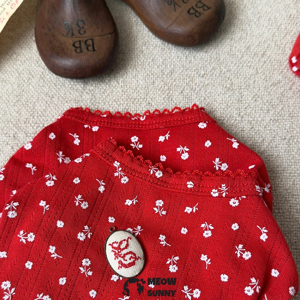 Mini red T-shirt with white lace trim featuring a dog