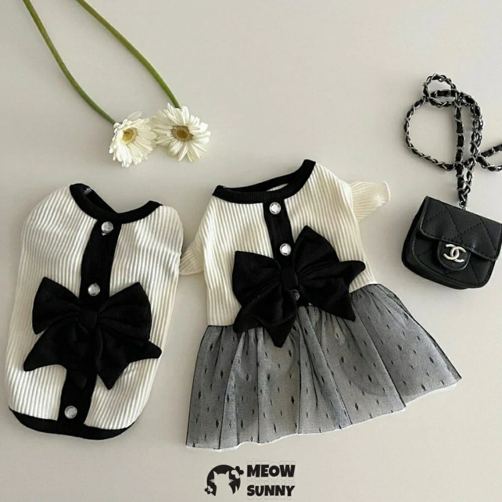 Pet dog clothes: Retro-style couple's outfits with bowknot dresses.