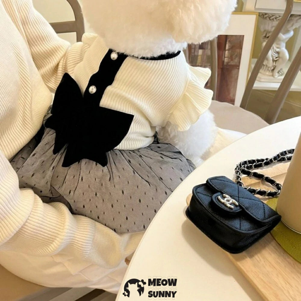 Pet dog clothes: Retro-style couple's outfits with bowknot dresses.